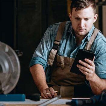 Man looking at handheld device