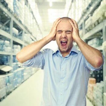 Man screaming in warehouse