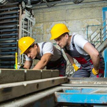 Two men in hardhats
