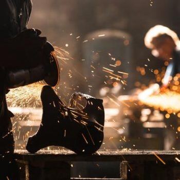 Grinding metal with sparks flying