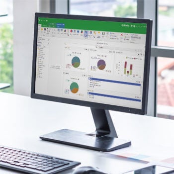 Computer monitor showing ERP dashboard