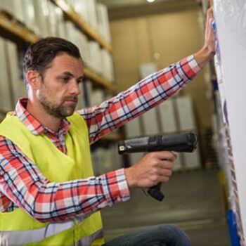 Man using label scanner
