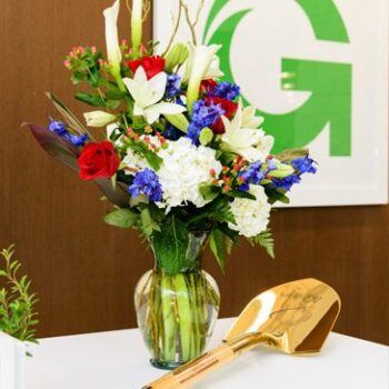 Vase of flowers and golden shovel