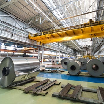 rolls of sheet metal in shop