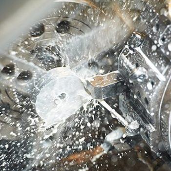 Machine running with water flying