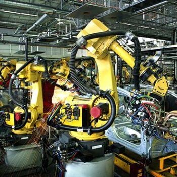 Robots working on parts