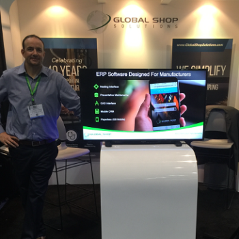 Man standing at tradeshow booth