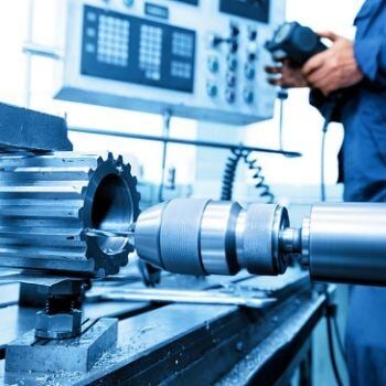 Close up of machine with a part it's working on