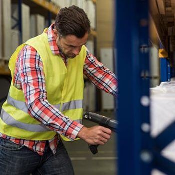Man scanning product on the shelf