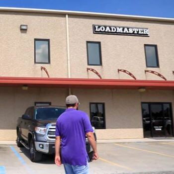 Man walking toward building
