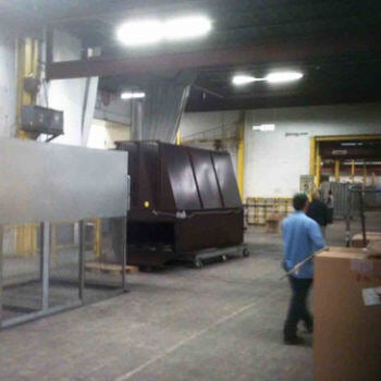 Man walking manufacturing shop floor