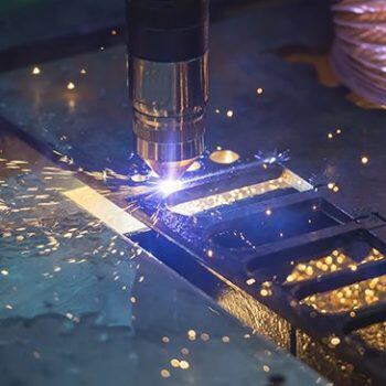machine cutting with sparks flying