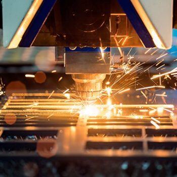 Machine cutting with sparks flying