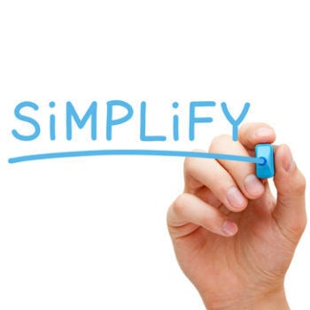Hand writing the word simplify