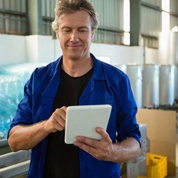 Man looking at an iPad