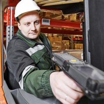 Man scanning items on shelf