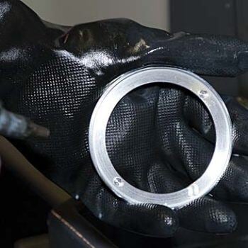 Hand holding metal ring