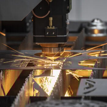 Nested machine cutting into metal