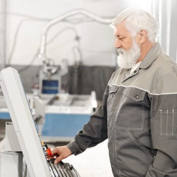 Manufacturer looking at machine
