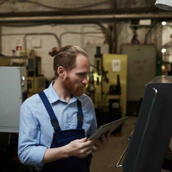 Manufacturer holding an iPad