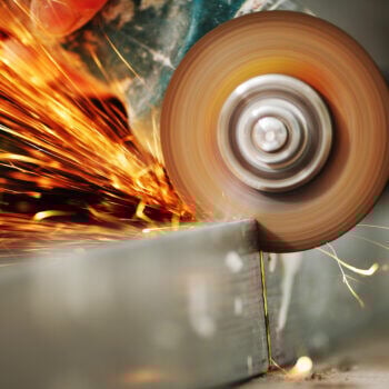 Grinding on metal with sparks flying