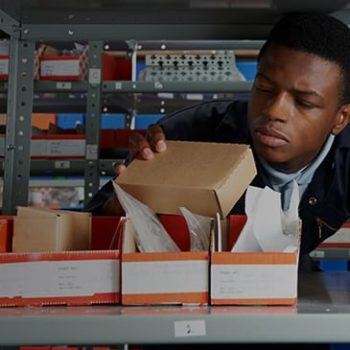 Man looking at a package
