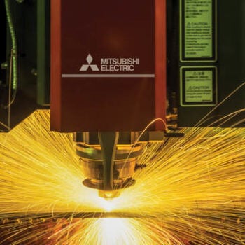 Nested machine cutting with sparks flying