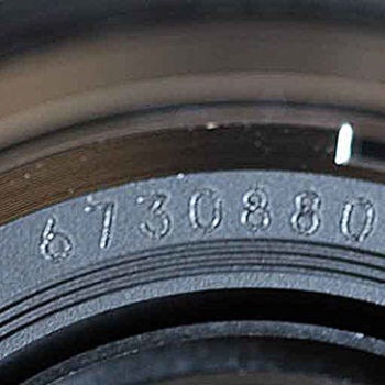 Close up of a part number on metal