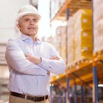 Man in hard hat on shop floor