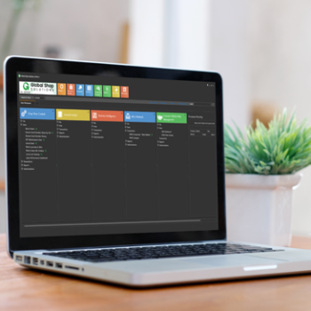 Laptop with ERP software on the screen