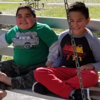 Two children on a bench