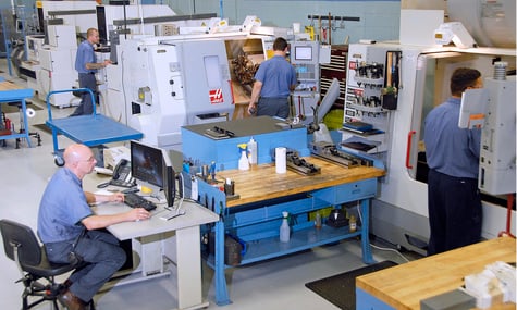 Automation Tool & Die employees at work on shop floor