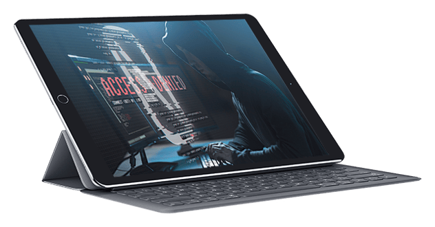 Digital tablet showing image of hacker using computer interface.