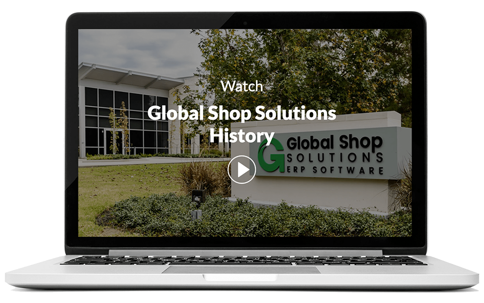 laptop showing Global Shop Solutions headquarters with video title and play button overlay