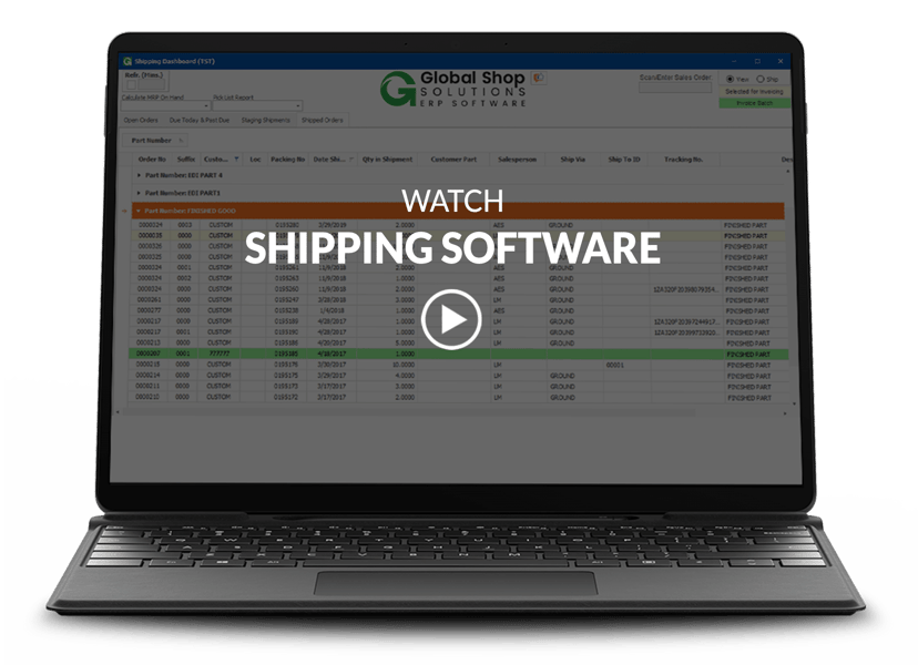 laptop showing shipping screen with video title and play button overlay