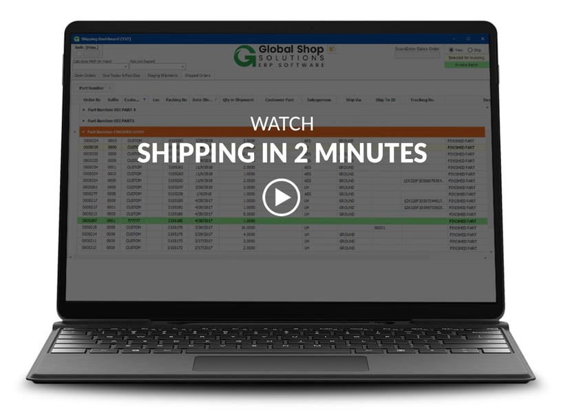 laptop showing shipping screen with video title and play button overlay